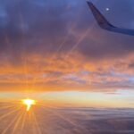 Blick aus dem Flugzeug auf die Sonne